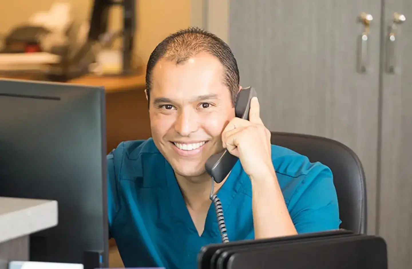 man answering phone