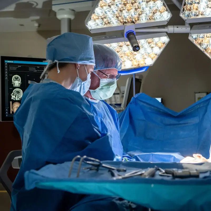 Neurosurgeons at a table