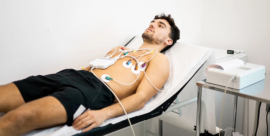 young man on ekg machine