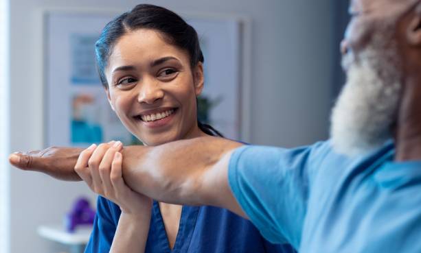 physical therapist with patient