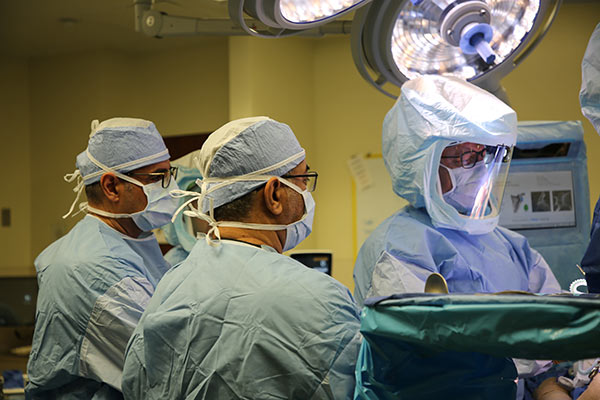 Dr. Price teaching while in surgery