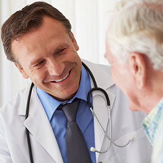 doctor talking to male patient about prostate cancer screening