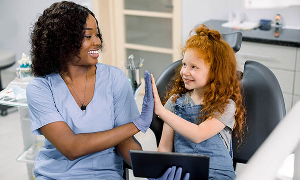 nurse with young girl