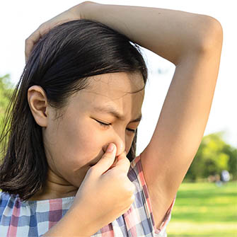 young girl with smelly armpit