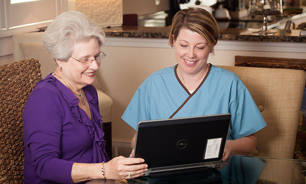 nurse reviewing patient info
