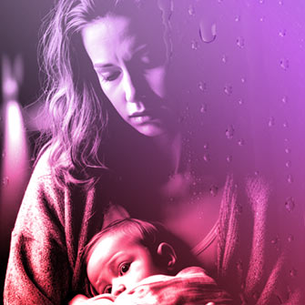 postpartum depression mom holding baby